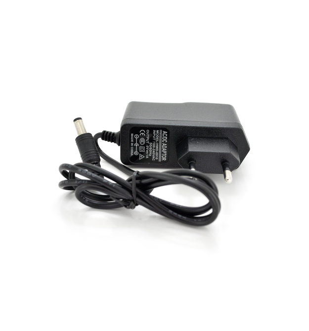 Импульсный адаптер питания YM-0910 9В 1А (9Вт) штекер 5.5 / 2.5 длина 0,9м Q200